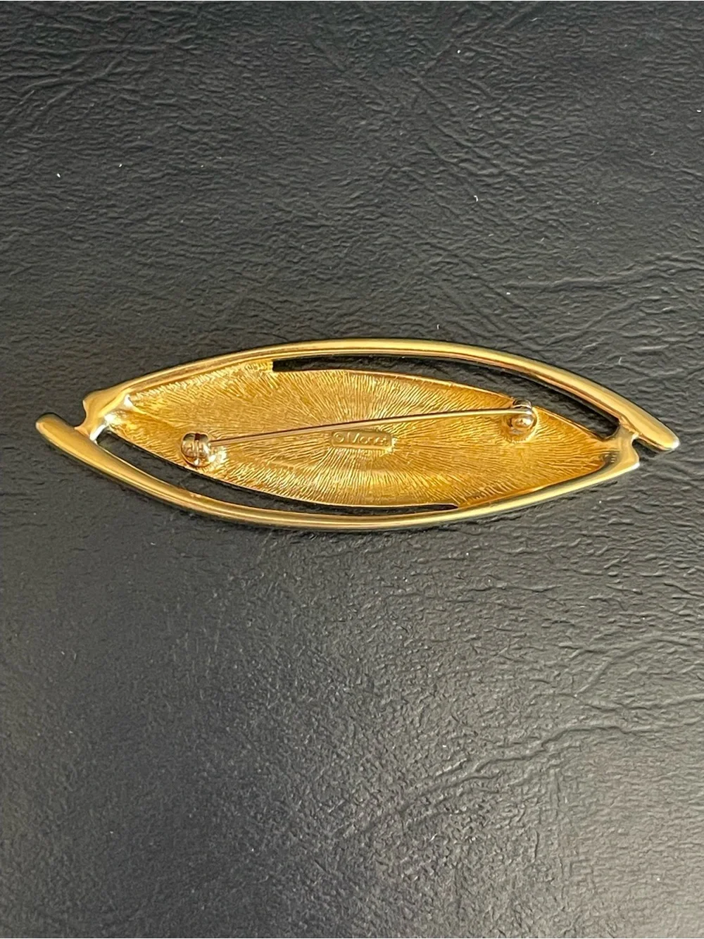 Vintage Monet Gold Tone & color enamel Marquise brooch.